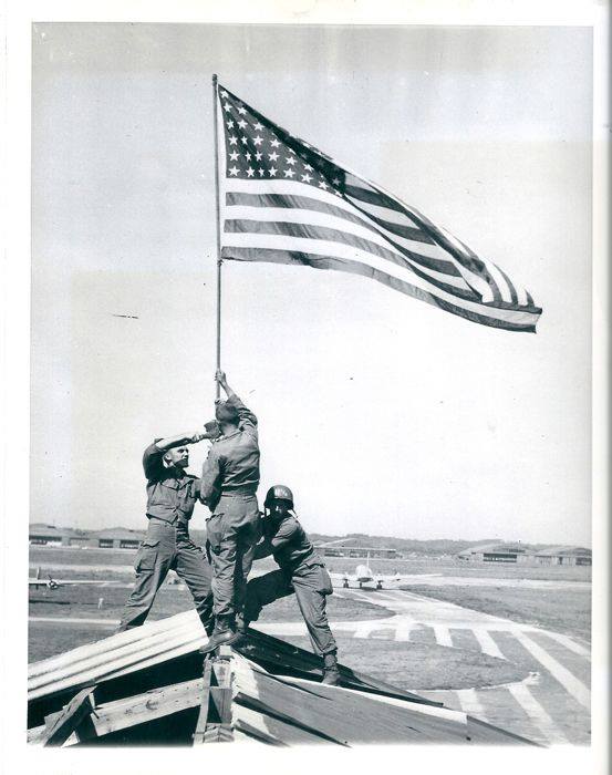 First Flag raised over Atsugi Japan by 11th Airborne Division